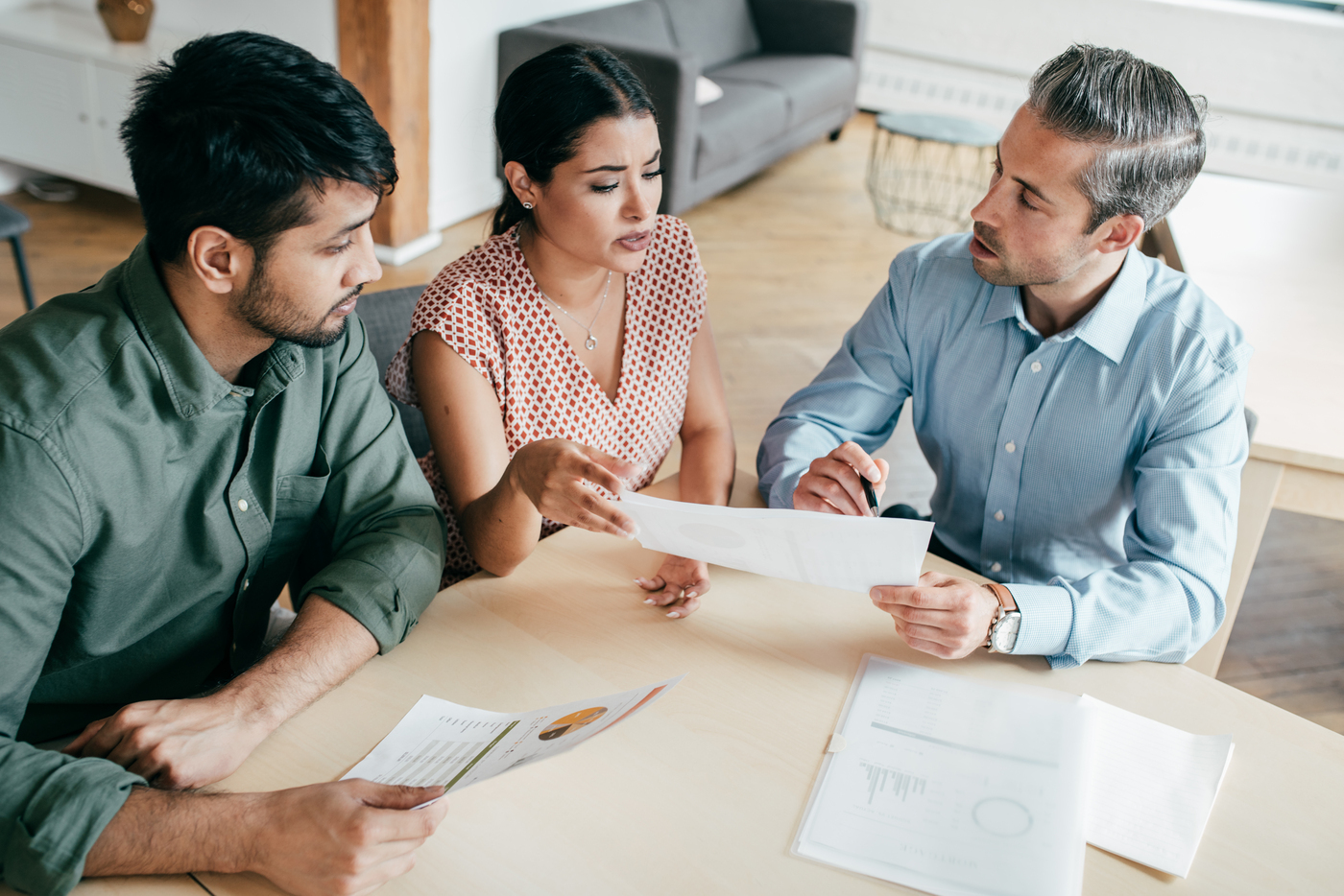 man providing professional advice to couple