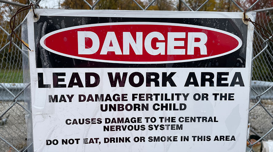 a sign detailing the dangers of lead